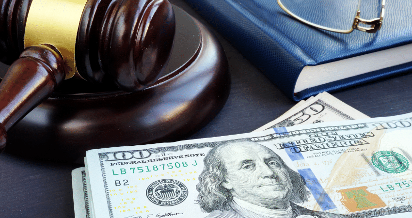 gavel next to stack of money