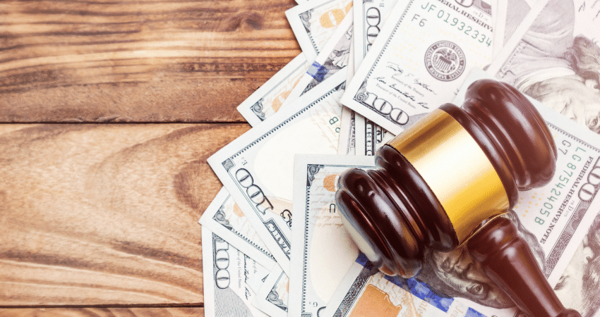 gavel on top of pile of cash for bail