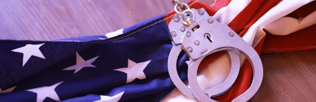handcuffs on American flag