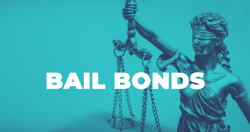 lady justice statue with words bail bonds