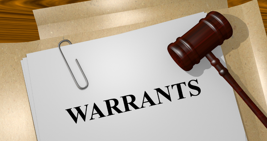 warrant papers with gavel