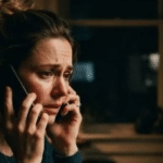 Worried woman on a late-night phone call about a loved one in jail